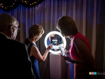 Couple Using the Photo Booth at a Wedding